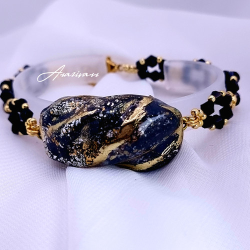 دستبند دفرمه پینترستی مشگی طلایی