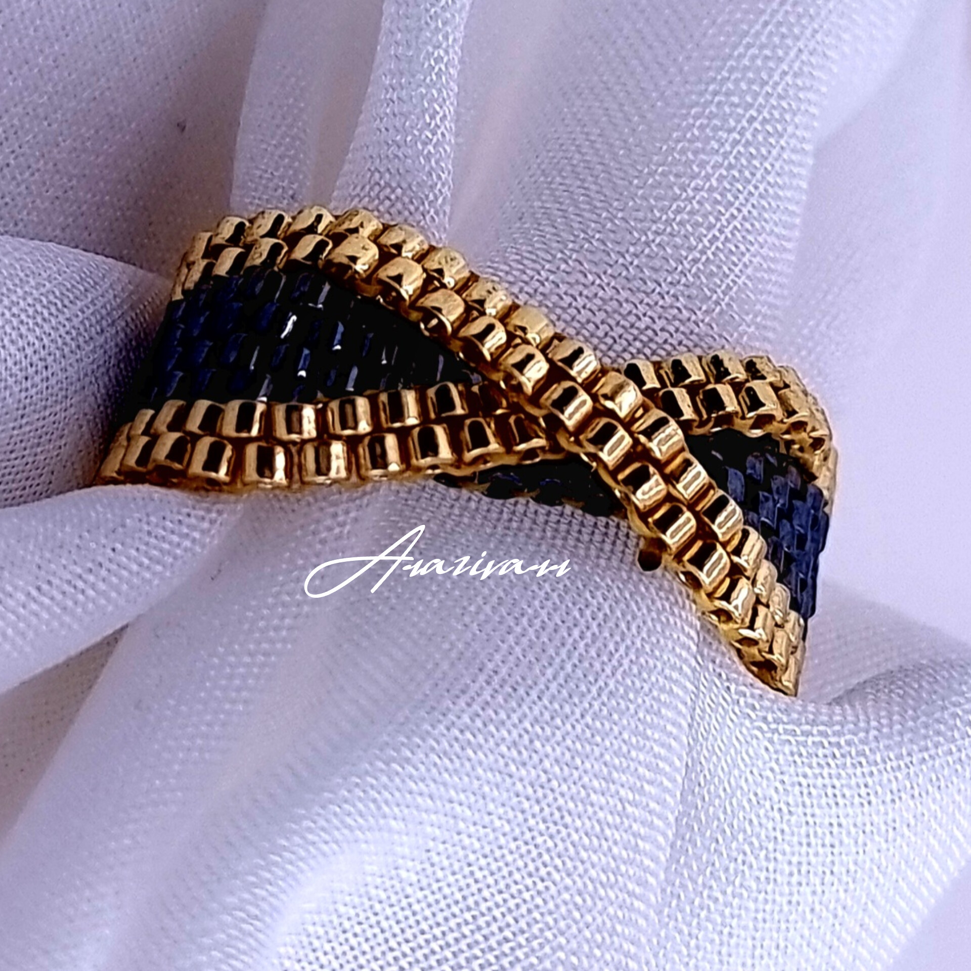 انگشتر ضربدری میوکی