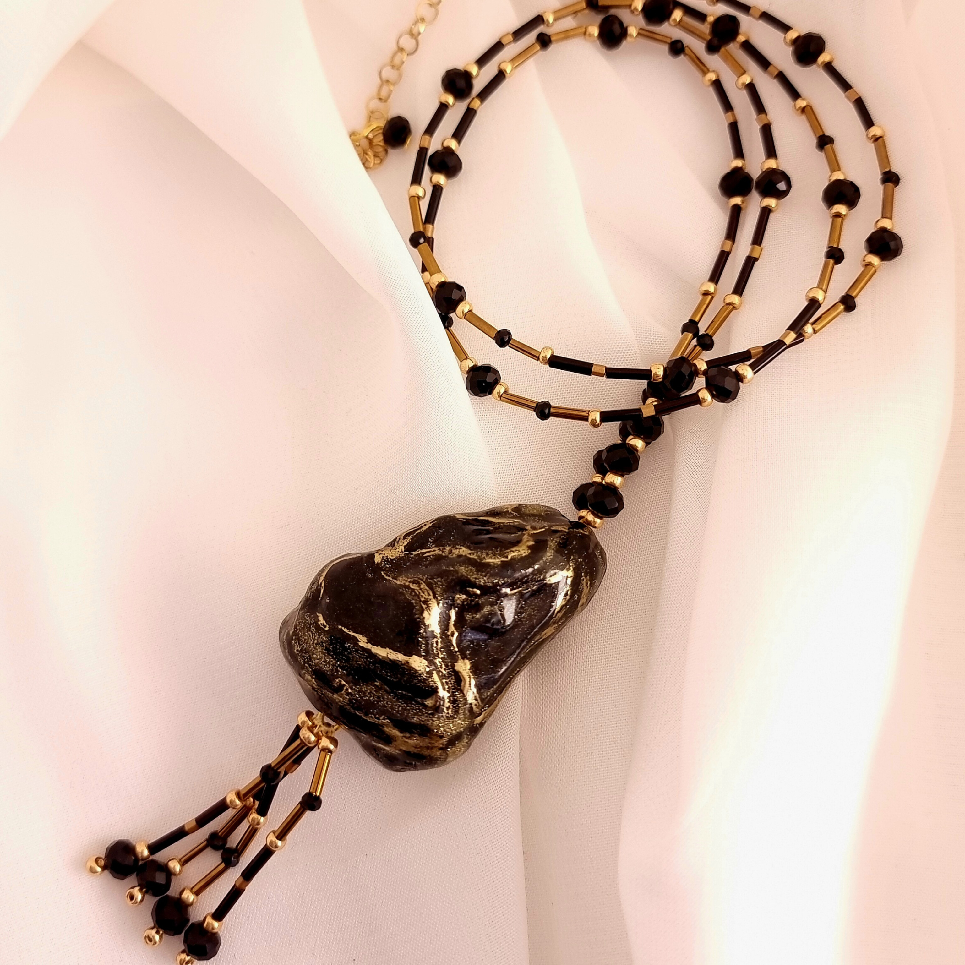 گردنبند رولباسی مشکی طلایی